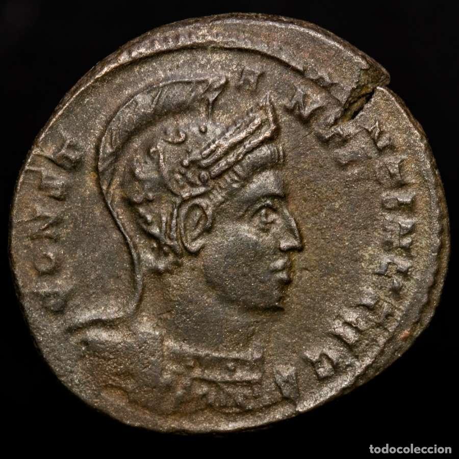 Monedas Imperio romano: Constantino I. &AElig; Follis - VIRTVS EXERCIT P✩T Ticinum. Doble golpe.