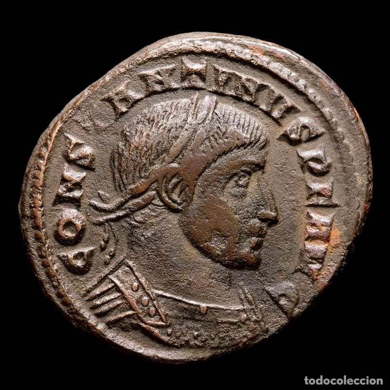 Monedas Imperio romano: Constantino I - follis. Ticinum. TT. MARTI CONSERVATORI. Escasa.