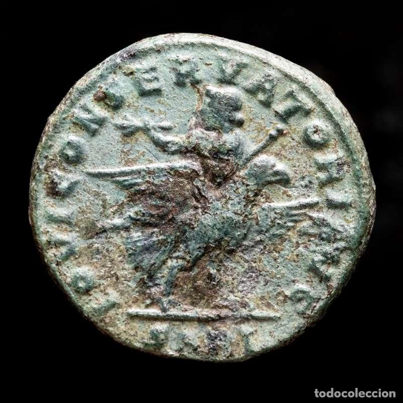 Monedas Imperio romano: Licinio I - AE follis. Arles. 319 dC. Jupiter sobre aguila.