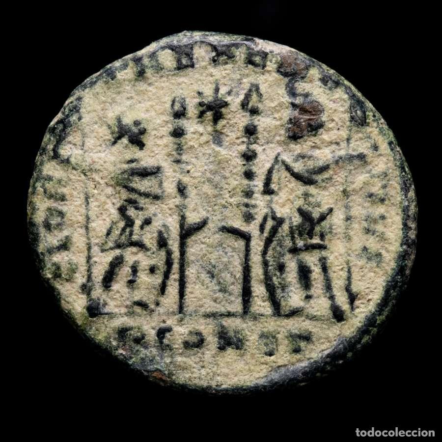 Monedas Imperio romano: Constantino I AE follis. Arles PCONST / Estrella. GLORIA EXERCITVS