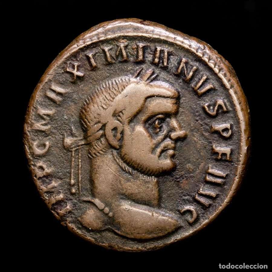 Monedas Imperio romano: Maximiano, Follis de Ticinum, 303 dC. - GENIO POPVLI ROMANI / ST