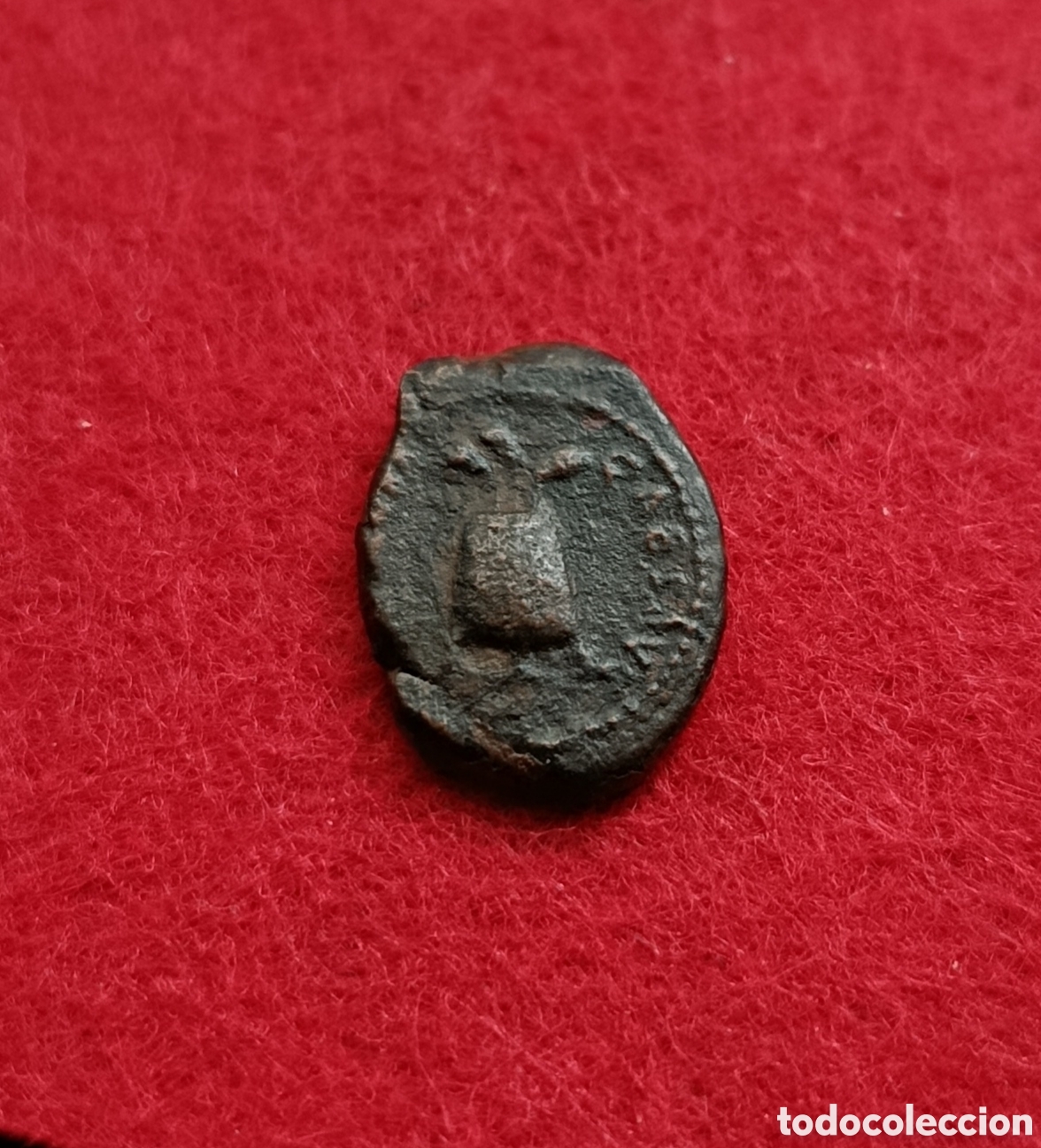 Monedas Imperio romano: Nerva AE Cuadrante. IMP NERVA CAES AVG, modius con tres espigas / SC, caduceo alado. Cohen 138.