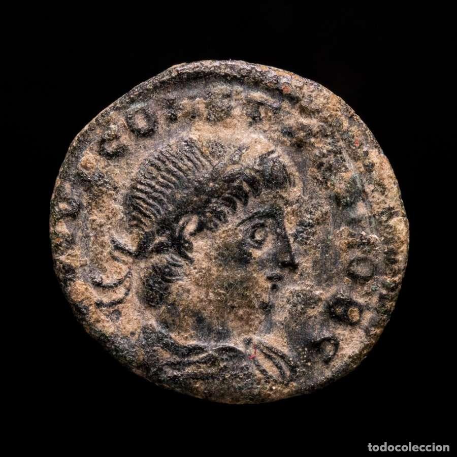 Monedas Imperio romano: Constante C&eacute;sar, follis. Antioquia. GLORIA EXERCITVS / SMANH (6358)