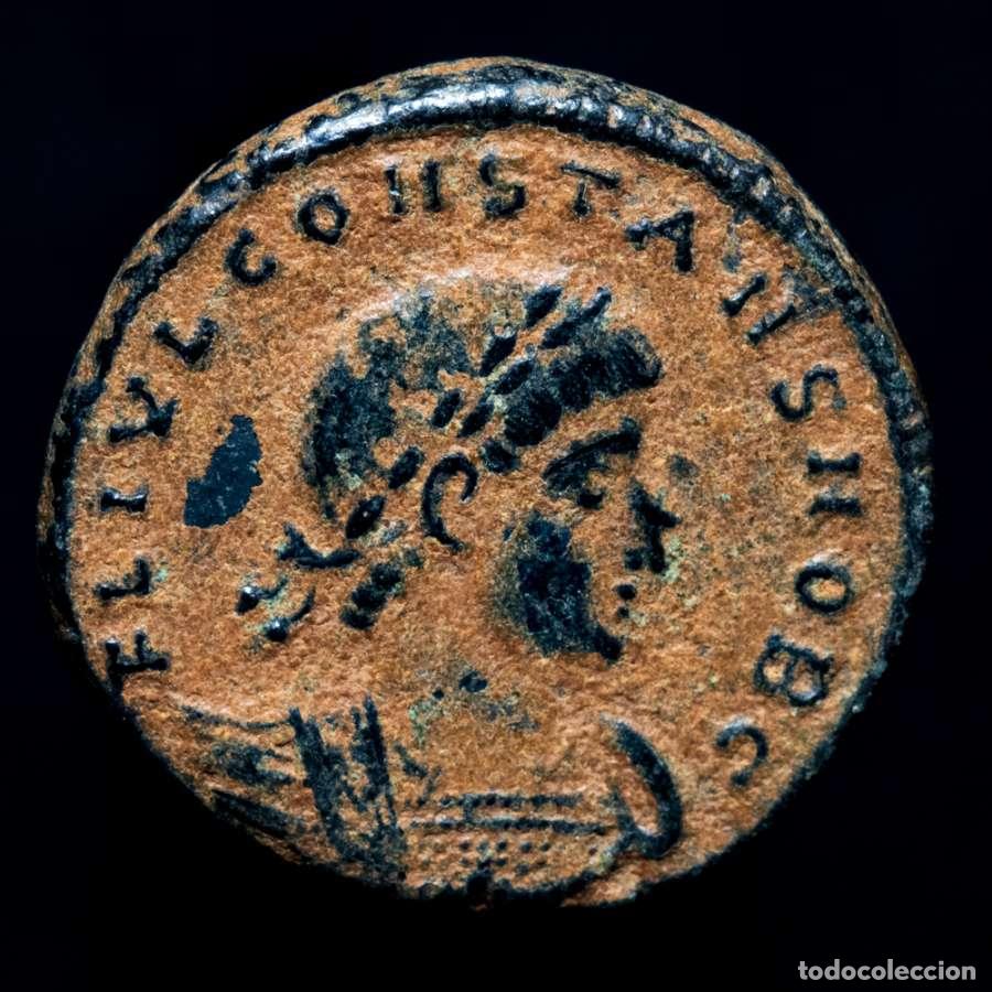 Monedas Imperio romano: Constante C&eacute;sar, follis. Antioquia. GLORIA EXERCITVS / SMANH (3679)