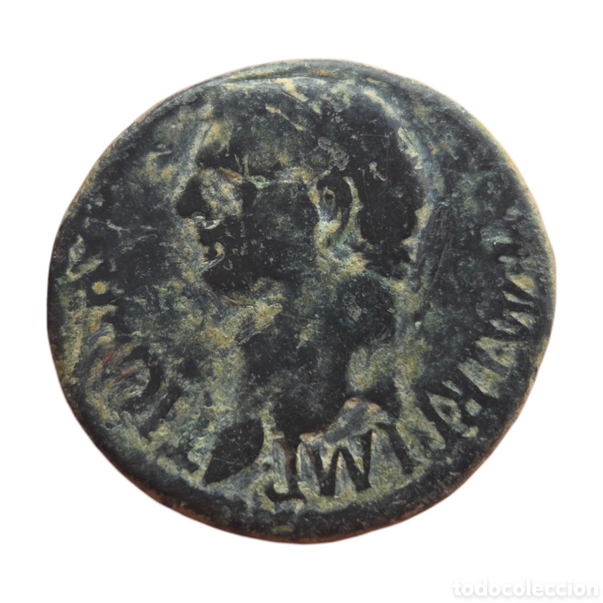 Monedas Imperio romano: As de Claudio , patina negra