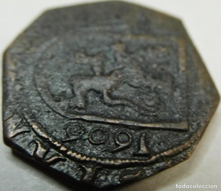 Monedas Imperio romano: token o jet&oacute;n comercial de bronce con forma octogonal acu&ntilde;ado en el a&ntilde;o 1696.