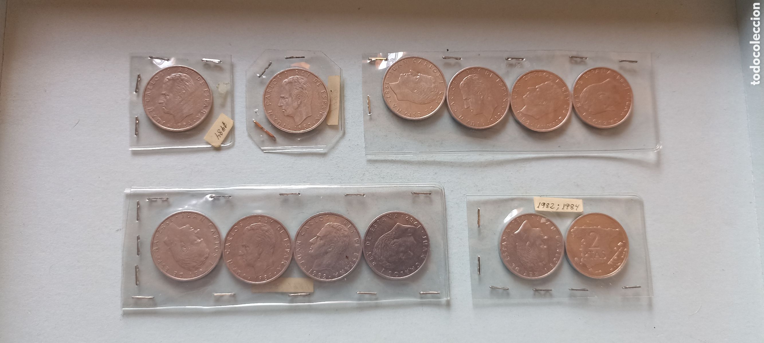 M&uuml;nzen unter Juan Carlos I: 12 monedas de 2 pesetas: 7 del a&ntilde;o 1982 y 5 del a&ntilde;o 1984