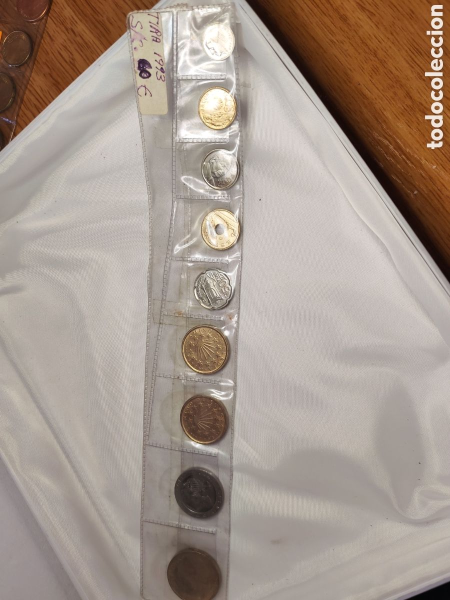 Moedas Juan Carlos I: Espa&ntilde;a. 1993 Tira 8 valores original. Juan Carlos I. 2 de 100 Pesetas flor de Lis arriba y abajo..