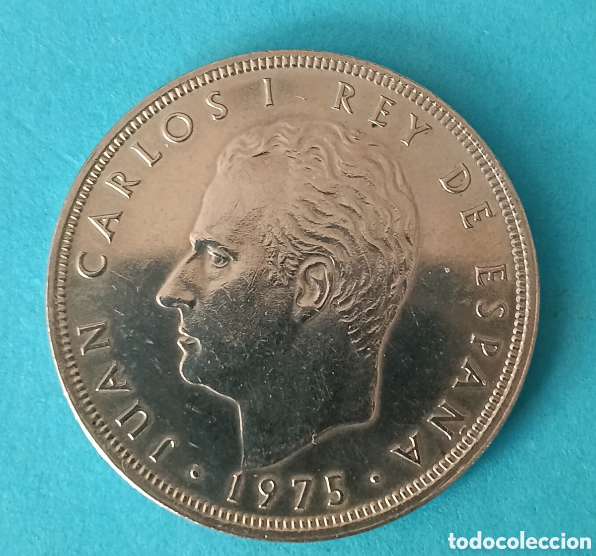 Monedas Juan Carlos I: 100 Pesetas Juan Carlos I 1975 *76 S/C error ( Deslizada , Cabello Rey ).