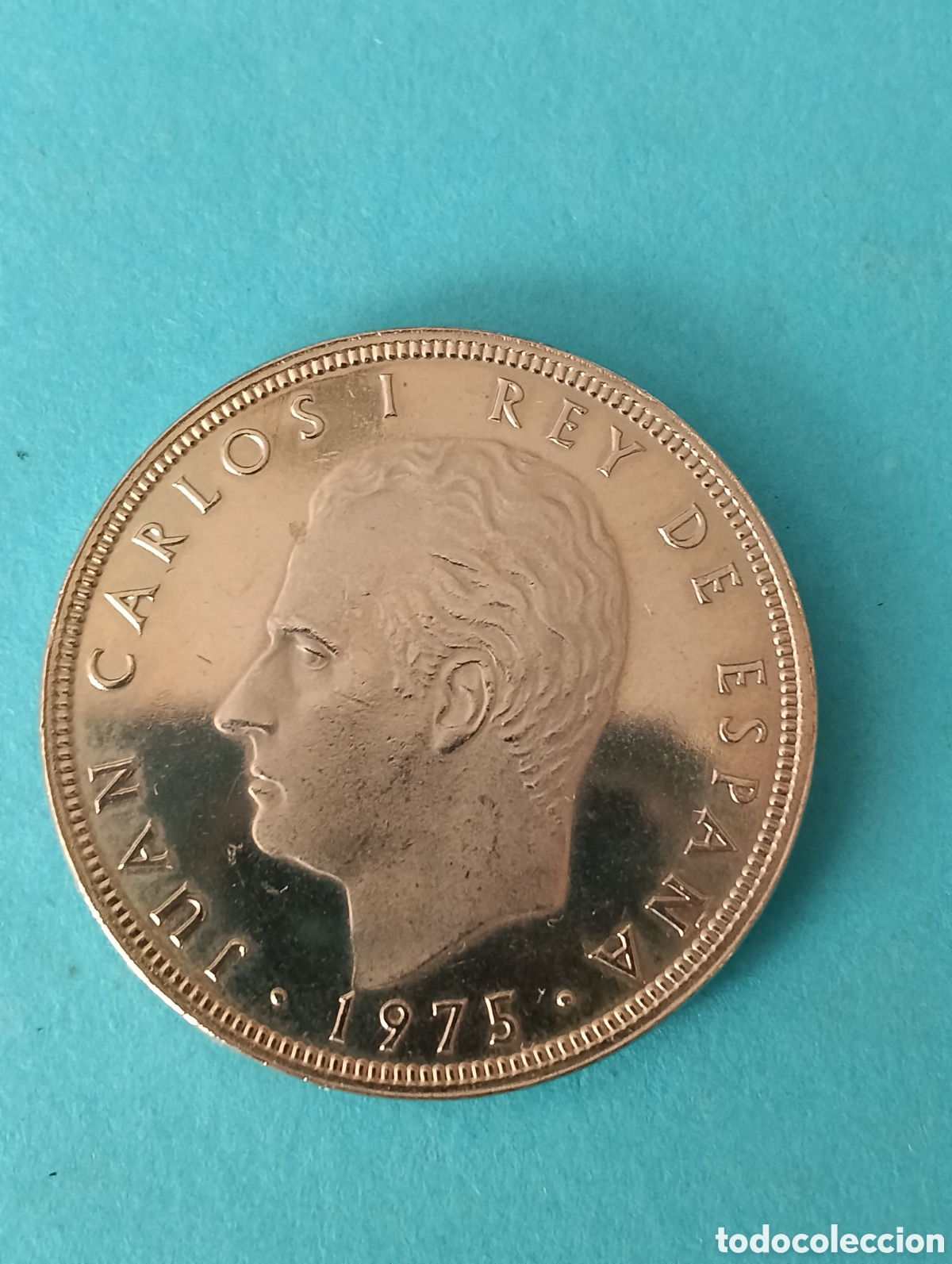 Monedas Juan Carlos I: 100 Pesetas Juan Carlos I 1975 *76 S/C error ( Deslizada, Chich&oacute;n Frente Rey , Tup&eacute;).