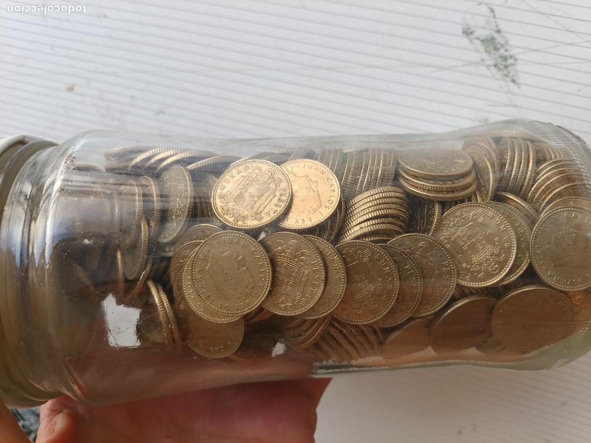 Monedas Juan Carlos I: Bote con cientos de monedas de 1 peseta rubia Juan Carlos I sin circular 1975 estrella 80