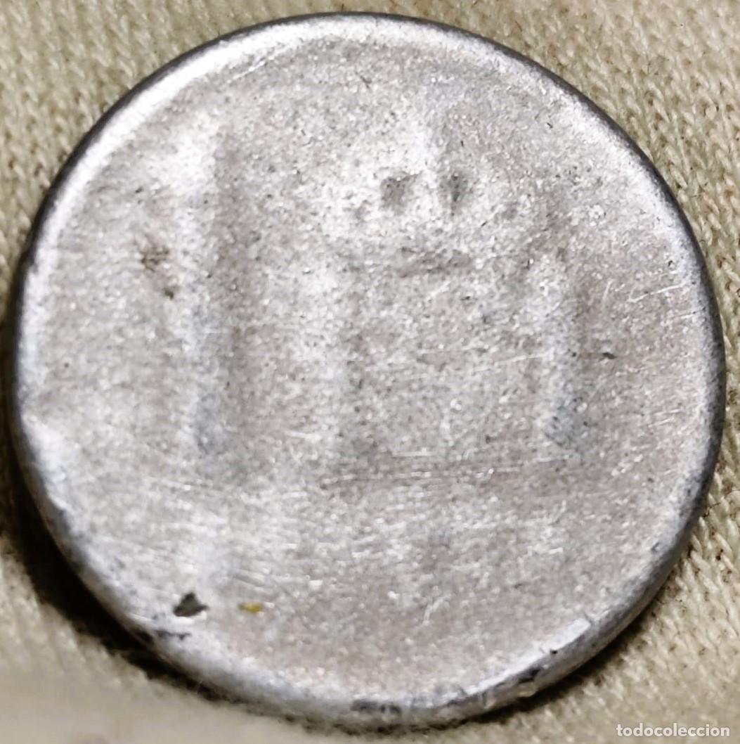Monedas Juan Carlos I: Espa&ntilde;a &ndash; 1 Peseta Juan Carlos I (A&ntilde;o no visible) &ndash; Aluminio &ndash; Pieza muy desgastada &ndash; Lote 2313