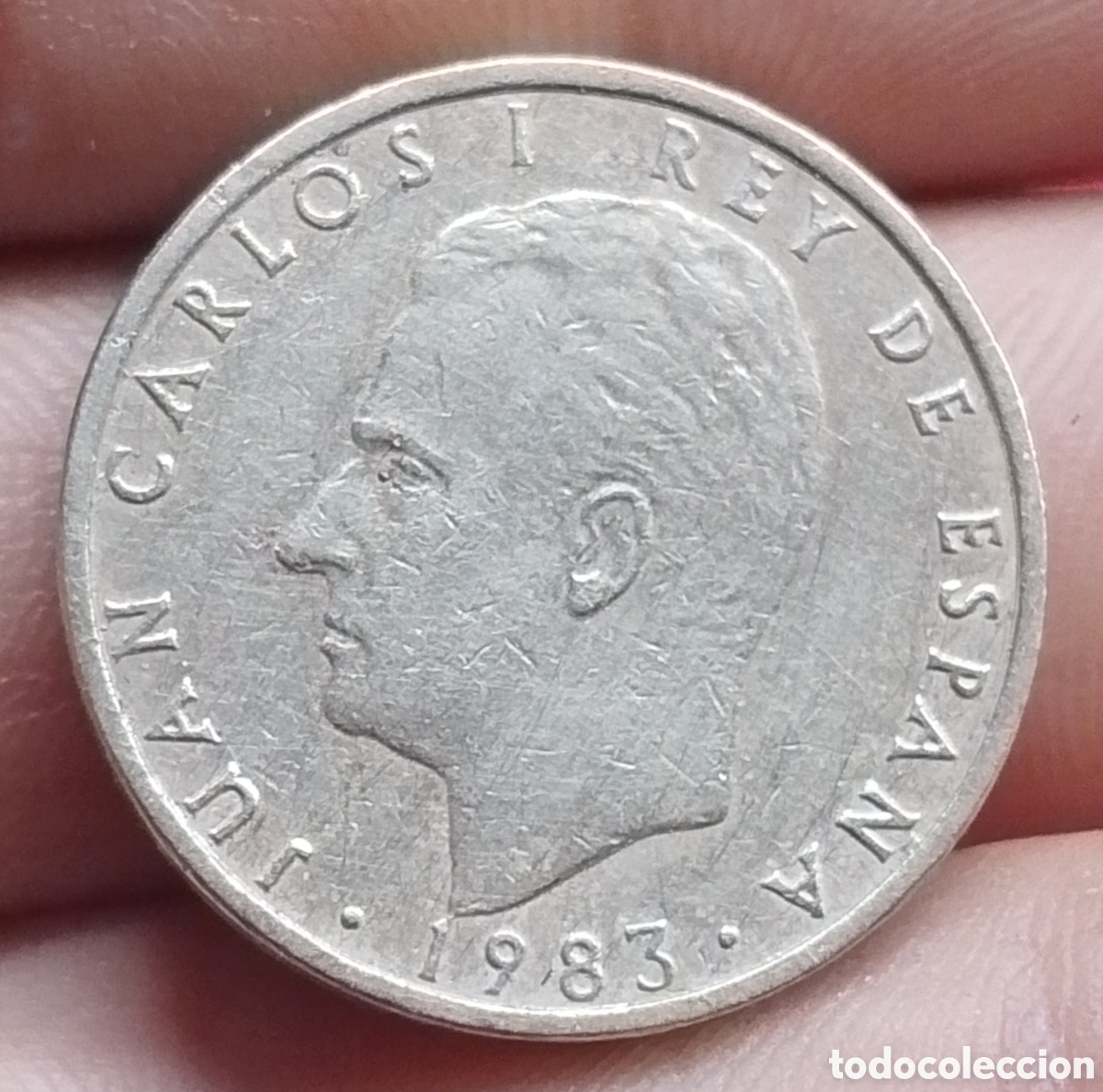 Monedas Juan Carlos I: A-Juan Carlos I 100 pesetas lis hacia anverso 1983