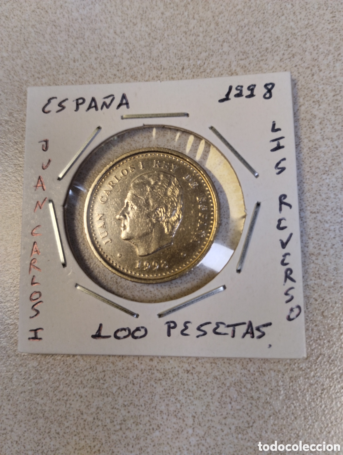 Monedas Juan Carlos I: Moneda de 100 pesetas Espa&ntilde;a a&ntilde;o 1998 lis reverso mbc encartonada