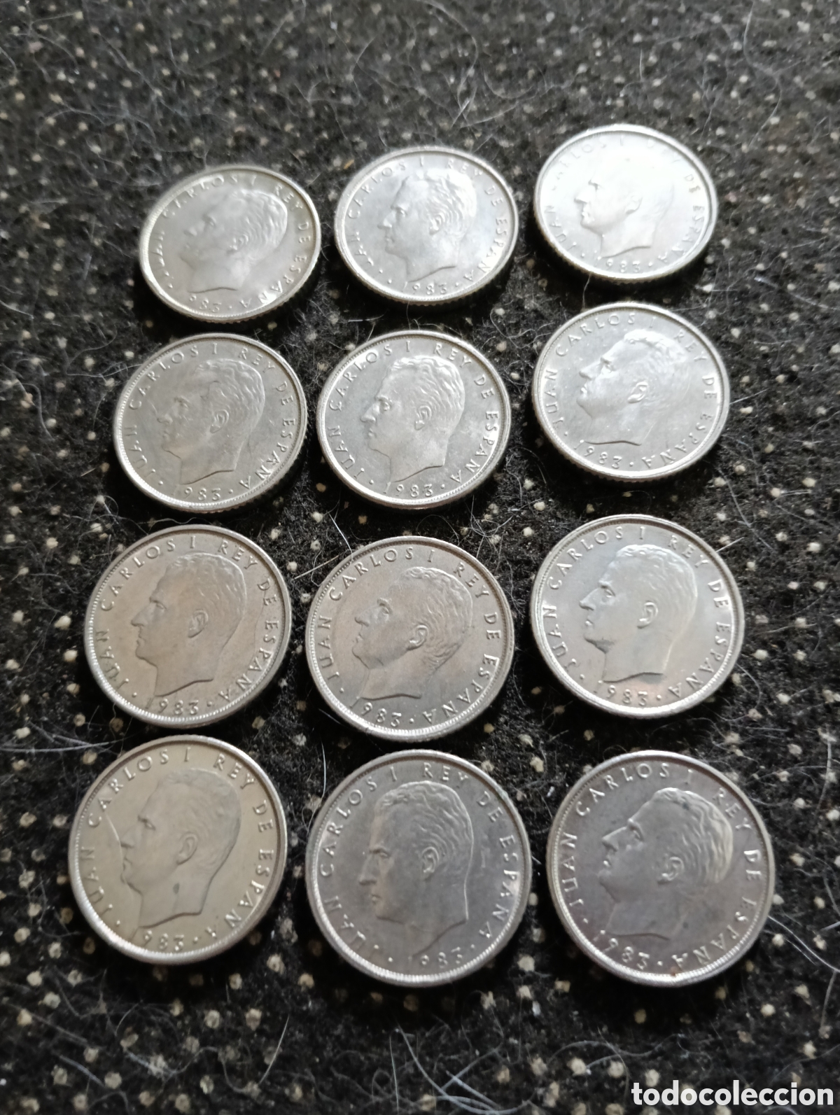 Monedas Juan Carlos I: Lote de 12 monedas de 10 pesetas de 1983 poco circuladas.