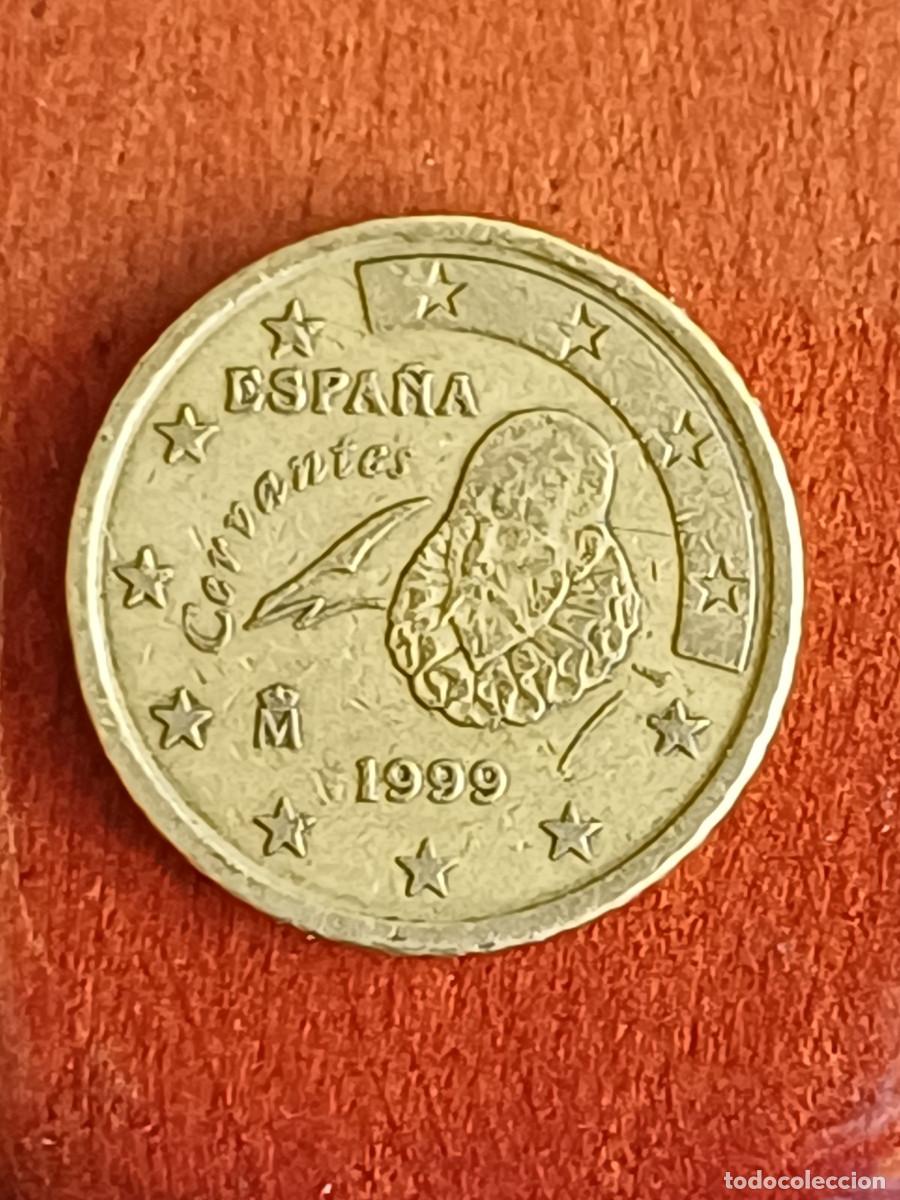 Monedas Juan Carlos I: Moneda de 50 centimos Cervantes de 1999 con errores evidentes por falta de material.