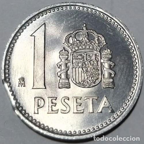 Monedas Juan Carlos I: Espa&ntilde;a, ERROR: 1 peseta 1983 lig. segmentada curva. La de las fotos.
