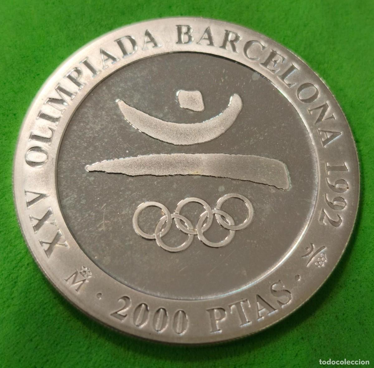 Coins Juan Carlos I: ESPA&Ntilde;A.A&Ntilde;O 1990. 2000 PTAS PLATA OLIMPIADA DE BARCELONA &rdquo;EMBLEMA&rdquo;. PESO 27 GR