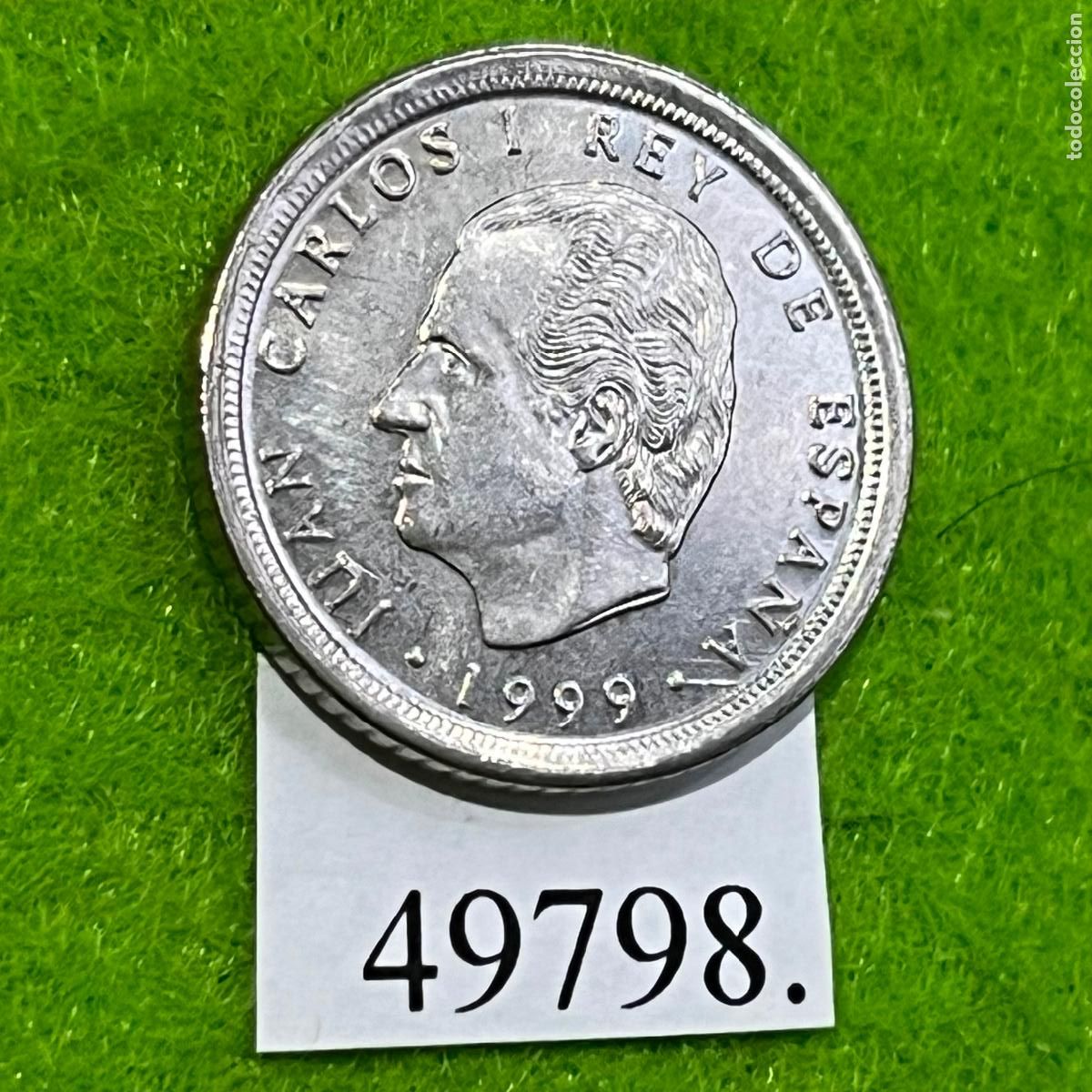 Monedas Juan Carlos I: Espa&ntilde;a 10 pesetas 1999, variante, error, empastado excesos de metal en 9 A, Juan Carlos I, 1⁰