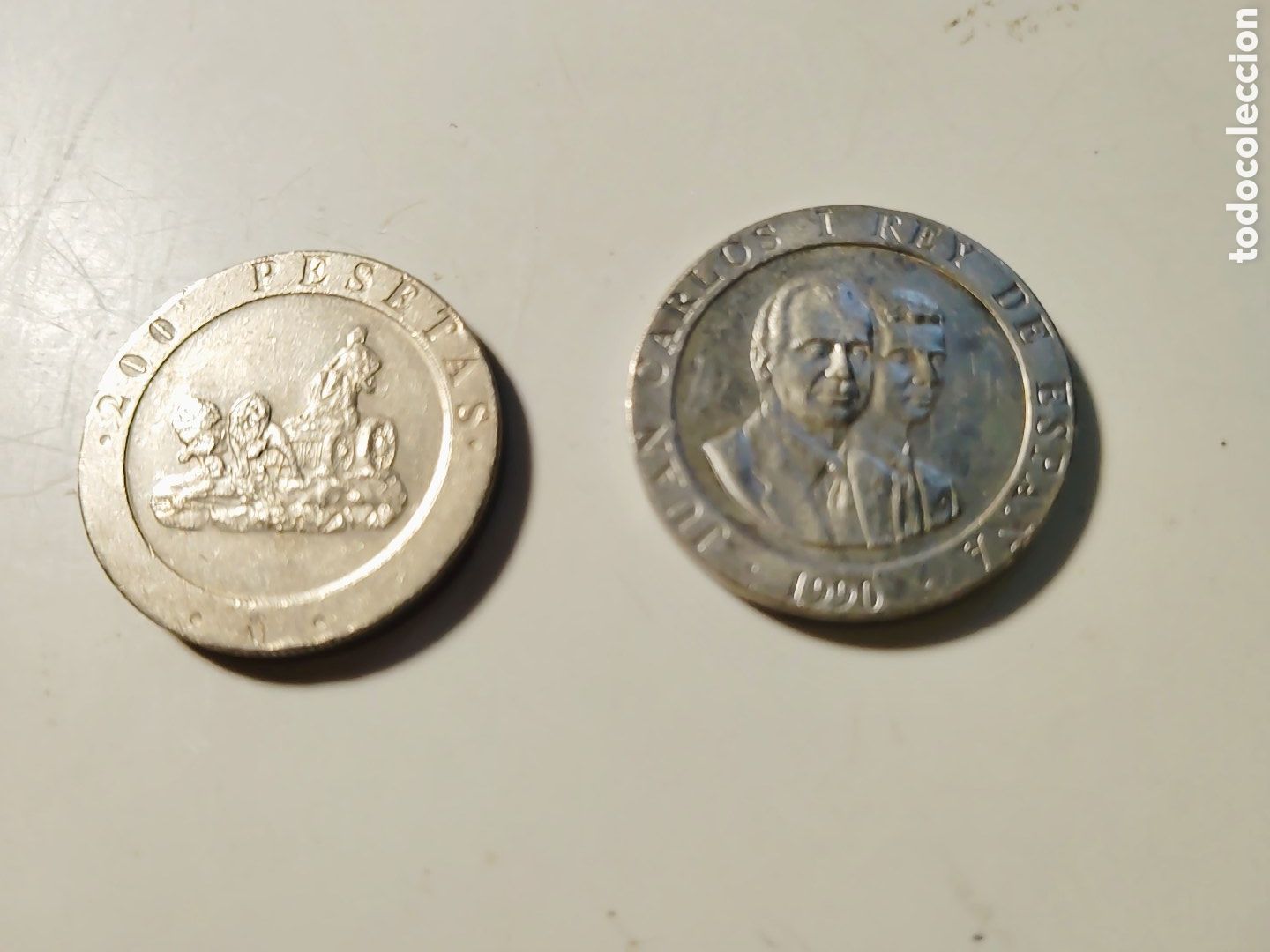 Monedas Juan Carlos I: Monedas conmemorativa de 200 pesetas a&ntilde;o 1990. Rey Juan Carlos con el Pr&iacute;ncipe. Reversa Las Cibeles