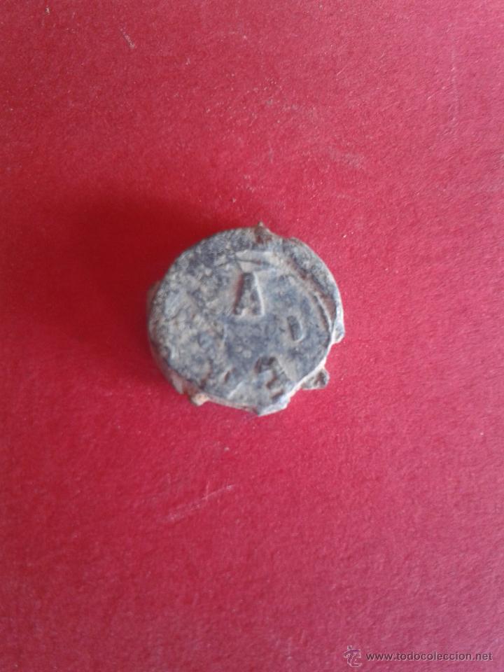 Monedas locales: ANTIGUO MARCHAMO DE PLOMO. A. 1934. - Foto 2