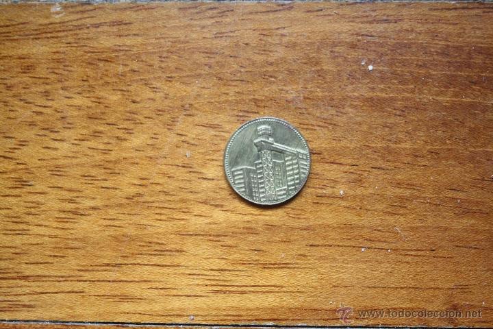 Local Coins: Ficha  comercial con Lletras KF ( No identificada)