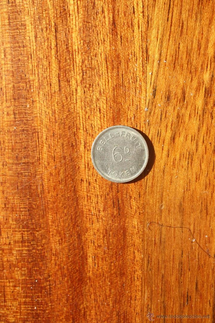Local Coins: BELL FRUIT 6-D TOKEN/
