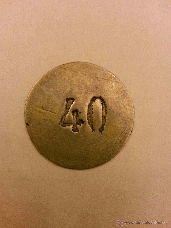Moedas locais: Chapa o ficha antigua con numeracion ,de 3,2 cms de diametro