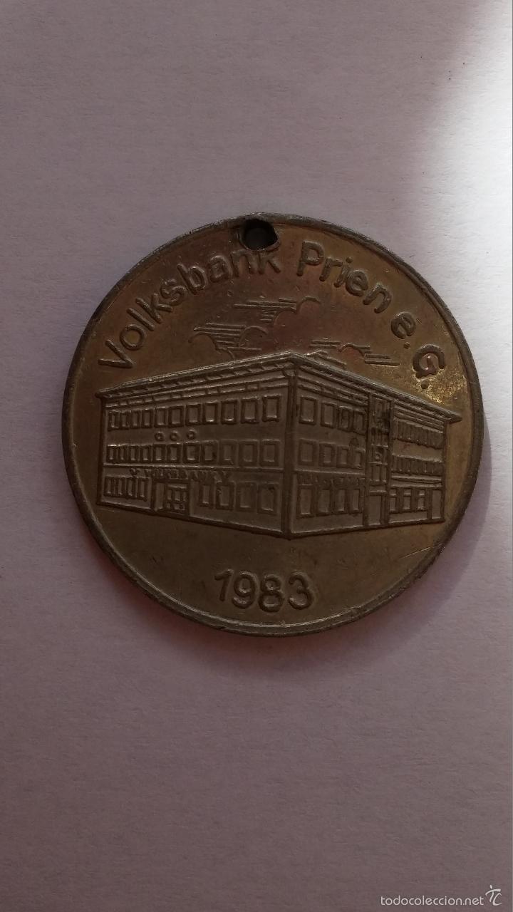 Moedas locais: moneda publicidad de banco aleman de 3 cms de diametro
