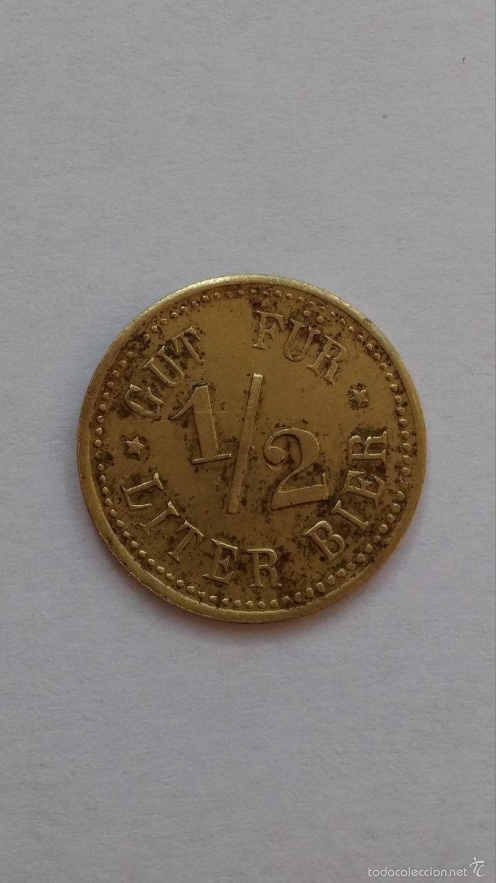 Moedas locais: Ficha alemana ,moneda ,vale por medio litro de cerveza,