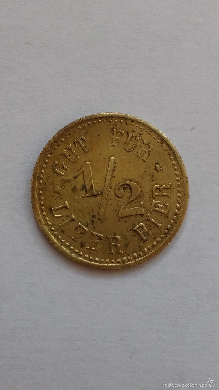 Moedas locais: Ficha ,moneda alemana ,vale por medio litro de cerveza