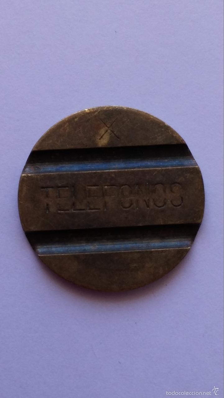 Moedas locais: Ficha , de telefonos espa&ntilde;ola con la x