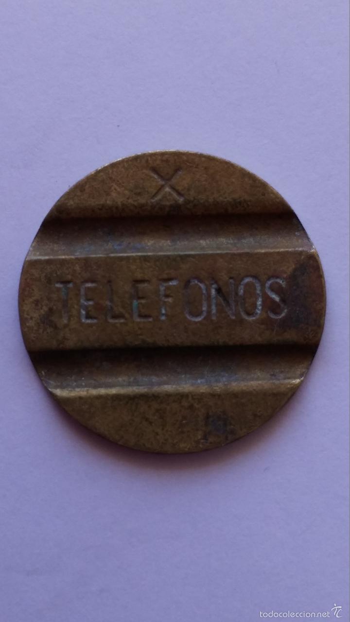 Moedas locais: Ficha , de telefonos espa&ntilde;ola con la x