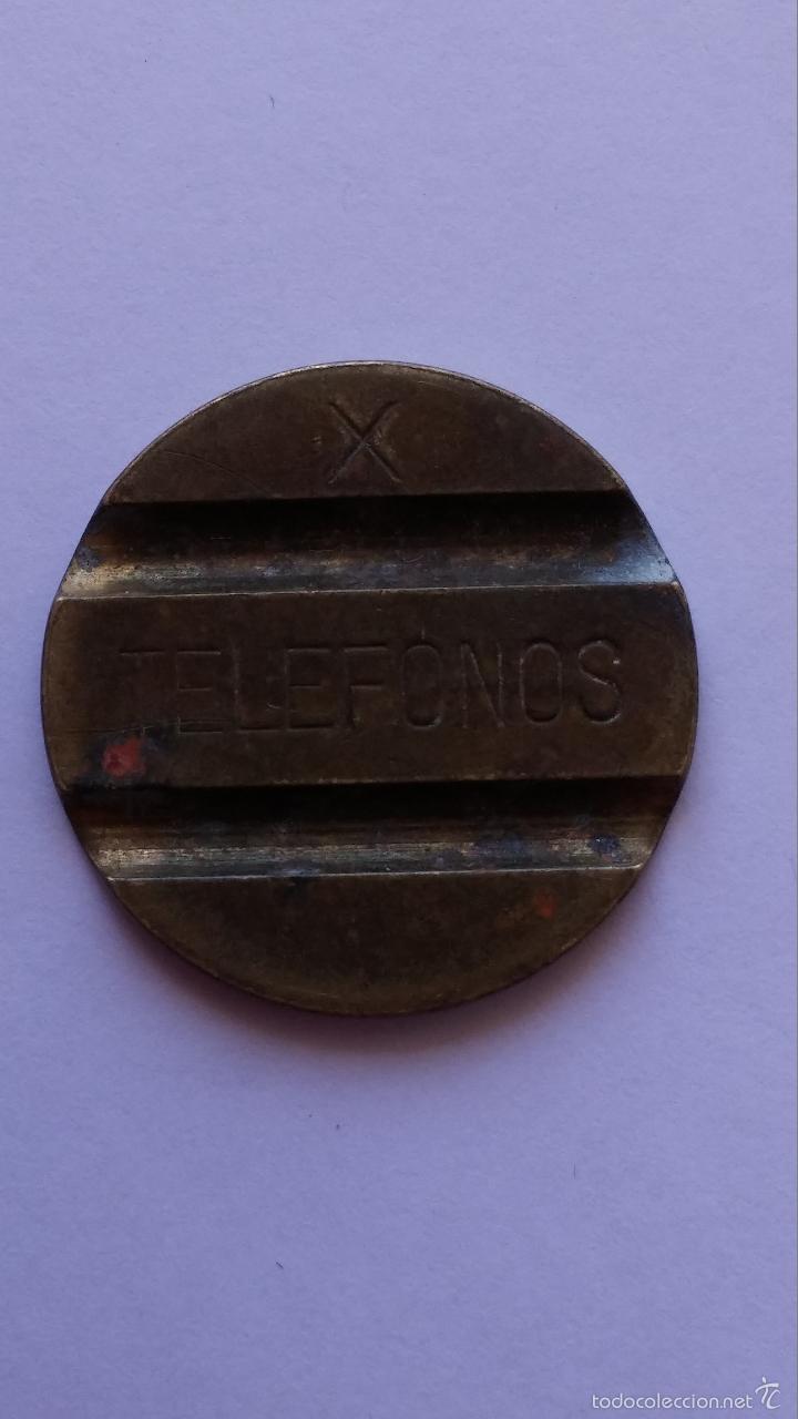 Moedas locais: Ficha , de telefonos espa&ntilde;ola con la x