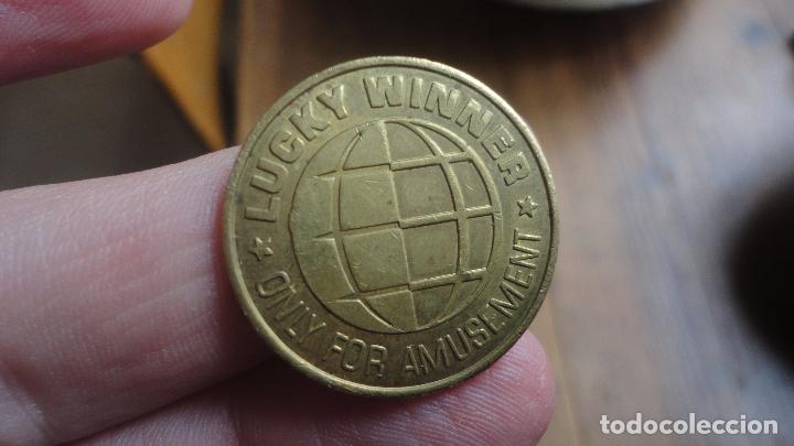 Monnaies locales: MONEDA O FICHA DE CASINO O PARQUE DE DIVERSIONES.EN INGLES.GANADOR AFORTUNADO