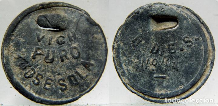 Monedas locales: PRECINTO O MARCHAMO COMERCIAL DE PLOMO VICH - Foto 1