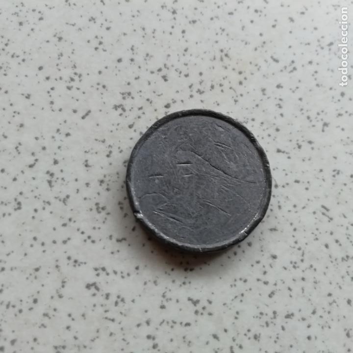 Monedas locales: Cospel de plomo de 100 pesetas - Foto 1
