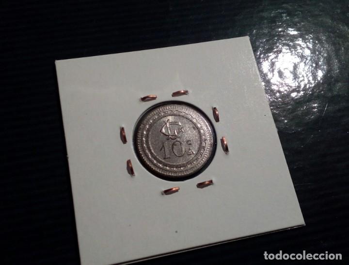 Monedas locales: FICHA DE 10 CTS - A LA D,OR - DOMAS - Foto 2
