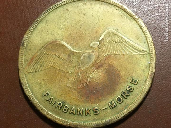Local Coins: Ficha moneda Fairbanks Morse re power with op ,4 cms diametro. Canada Estados Unidos.