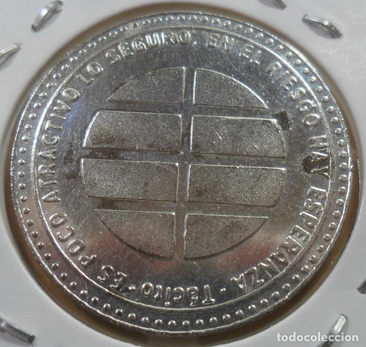 Monedas locales: FICHA TACITO - EL MUNDO 1989 / 2004 - Foto 2