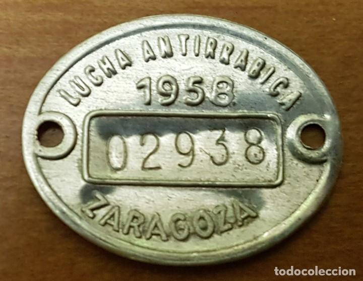 Monedas locales: Ficha antirrabiza zaragoza 1958 - Foto 1