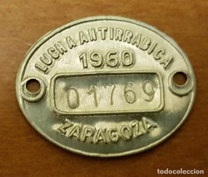 Monedas locales: Ficha antirrabiza zaragoza 1960 - Foto 1