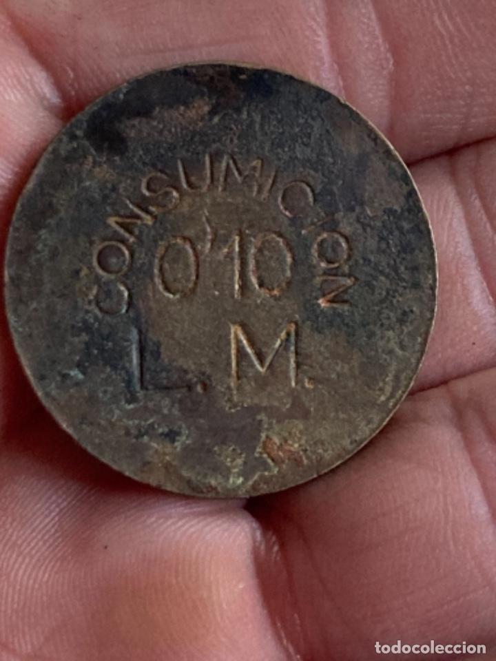 Monedas locales: Antigua ficha a identificar - Foto 1