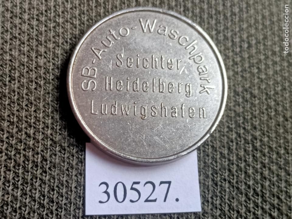 Moedas locais: ficha, token, jet&oacute;n