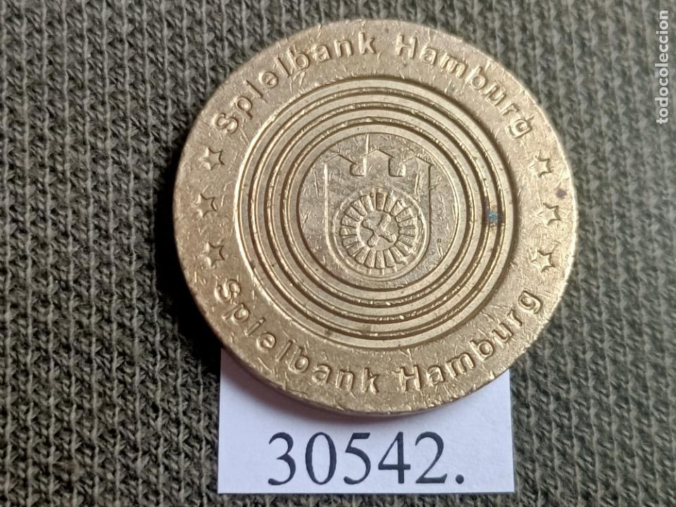 Moedas locais: ficha, token, jet&oacute;n