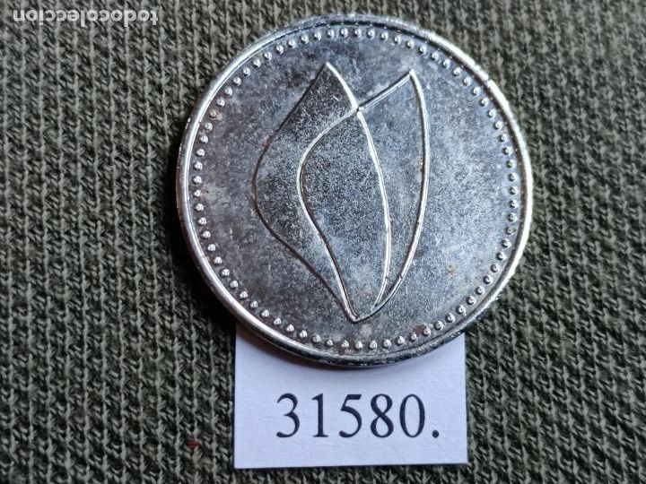 Monedas locales: Ficha autolavado, token, jeton