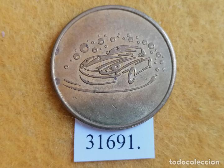 Monedas locales: Ficha autolavado, token, jeton - Foto 1