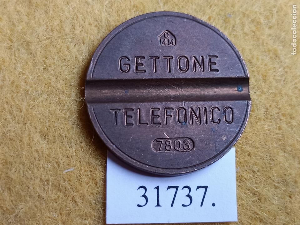 Monete locali: ficha tel&eacute;fono 7803 CMM, token, jet&oacute;n
