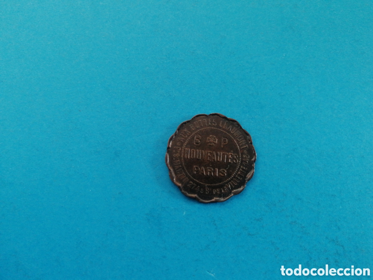 Monedas locales: Ficha Noveautes Paris - Foto 1