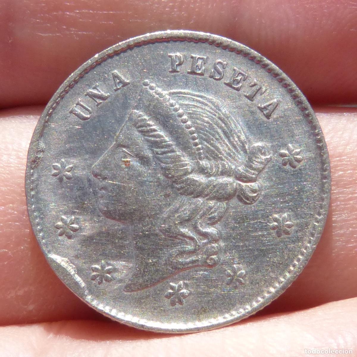 Monedas locales: Antigua ficha de casino de una peseta, 23mm, 5,49gr.